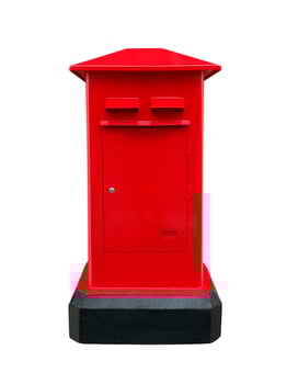 Red post box isolated on white background photo