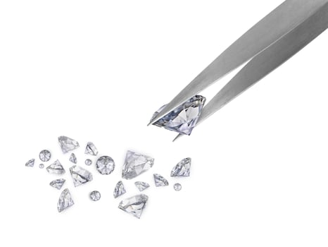brilliant cut diamond held by tweezers photo