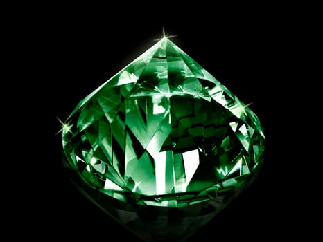 Dazzling diamond Green gemstones on black background photo