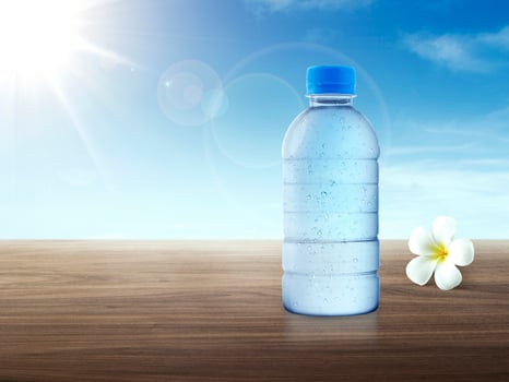 Morning empty water bottle on table photo