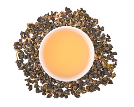 Chinese oolong tea Tie GuanYin isolated on white background photo