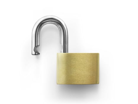 An unlocked lock on white photo
