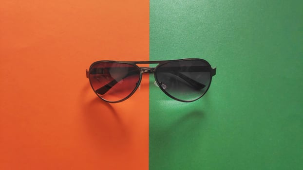 Sunglasses isolated color and light background photo