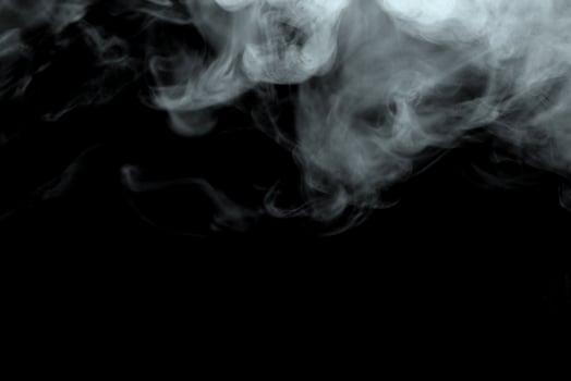 Abstract powder or smoke effect isolated on black background,Out of focus photo