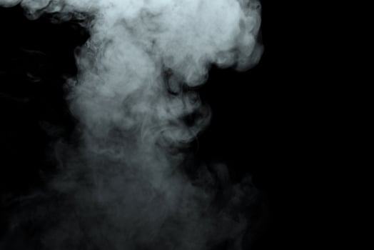 Abstract powder or smoke effect isolated on black background,Out of focus photo