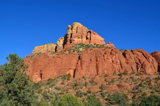 Gorgeous Sedona Red Rock Formation under Blue Skies photo