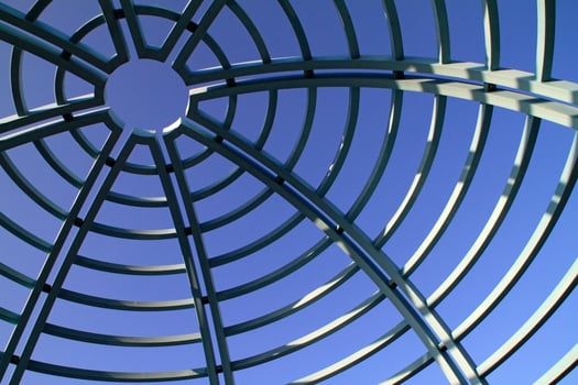 Centric roof pattern against blue sky photo