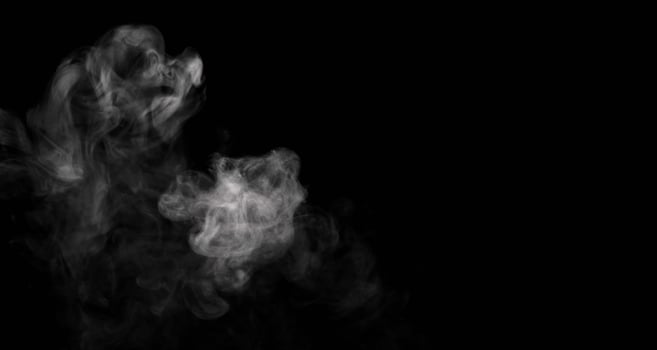 Abstract powder or smoke isolated on black background photo