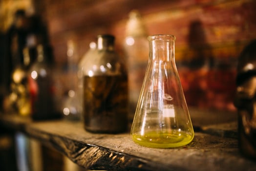 Antique medical bottle. Dark mystery halloween concept photo