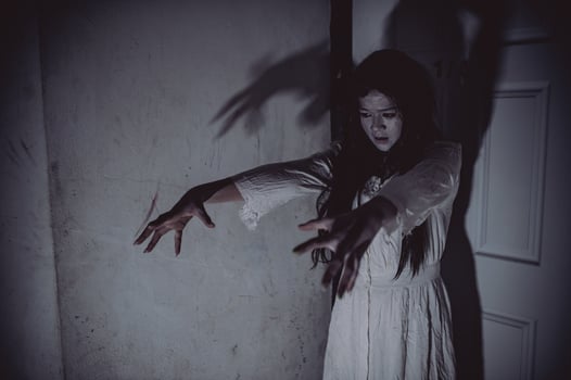 Portrait of asian woman make up ghost,Scary horror scene for background,Halloween festival concept,Ghost movies poster photo