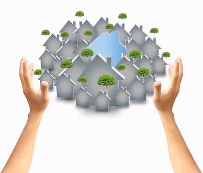 house in human hands photo