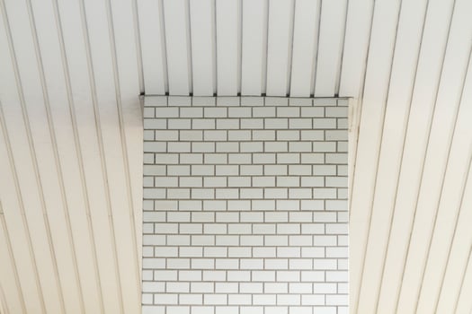 White tiled pattern and white ceiling pattern photo