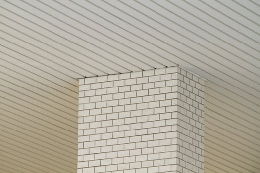 White tiled pattern and white ceiling pattern photo