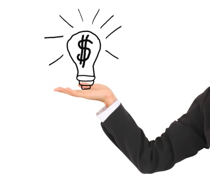 Businessman hand show and idea for making money on the whiteboard. photo