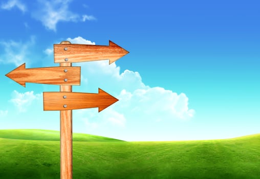 arrow sign on blue sky with clouds photo