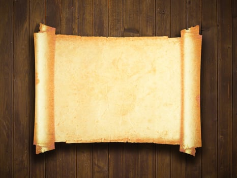 old paper manuscript on brown wood texture with natural patterns photo