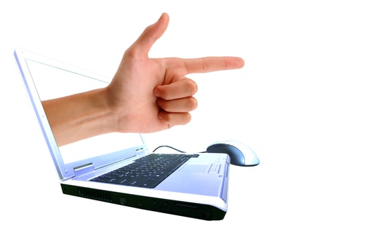 A hand giving everyone through a laptop. Isolated on a white background photo