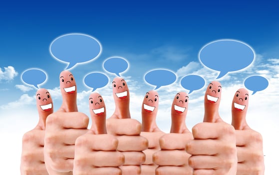 group of finger faces with social chat sign and speech bubbles photo