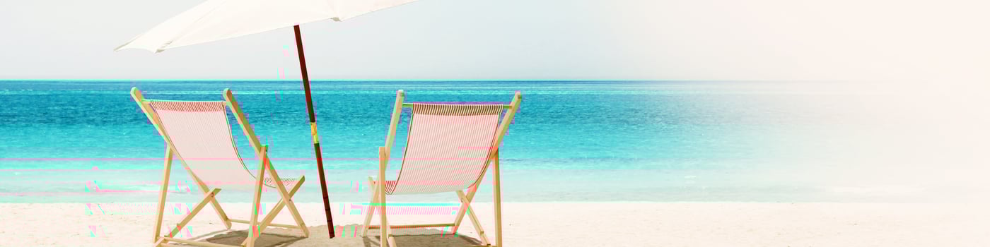 Relax on tropical beach in the sun on deck chairs. photo