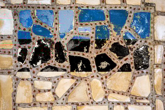 National flag of  Estonia on stone  wall background. Flag  banner on  stone texture background. photo