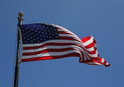 American flag waving in the wind photo