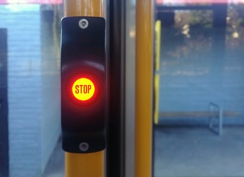 Bright STOP button on a tram photo