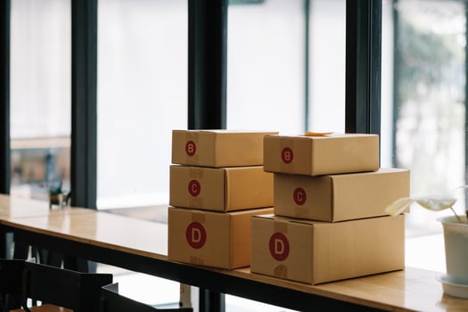 Ready to shipping, group of cardboard box delivery on wooden desk photo