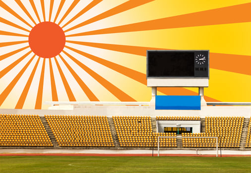 Stadium with scoreboard and sun ray photo