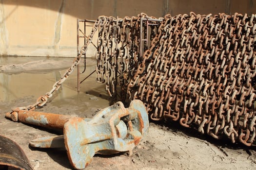 Old rusty ship anchor chain links close up. photo