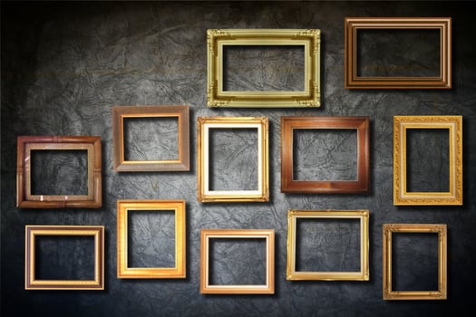 golden frame on old wall photo
