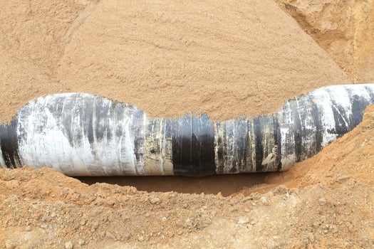 the long pipeline on a countryside photo