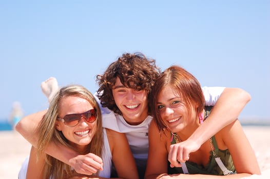 Three friends on the beach photo