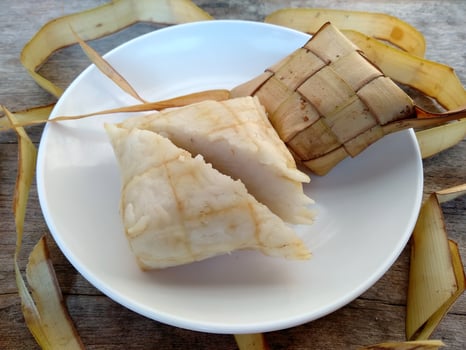 Ketupat or Rice Dumpling On a plate. Indonesian culinary food photo