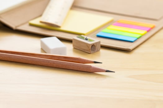 pencil on notebook concept education school equipment on wood table photo