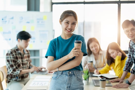 Group of asian young creative happy enjoy laugh smile and great success emotion teamwork people business startup entrepreneur casual brainstorm business meeting office background photo