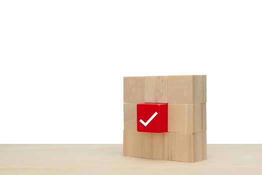 Business icon good feedback on wooden cube. photo