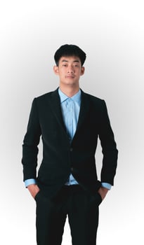 An Asian man wearing a black suit photo