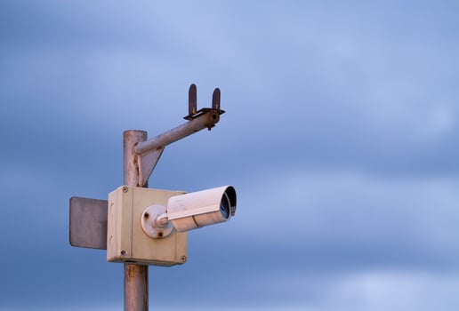 Old cctv with blue sky background photo