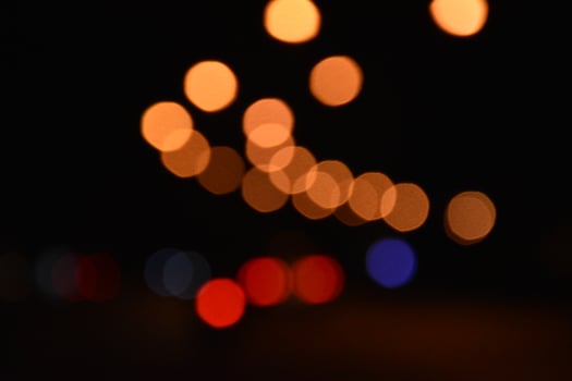 Bokeh street light at night time in urban city of thailand. photo