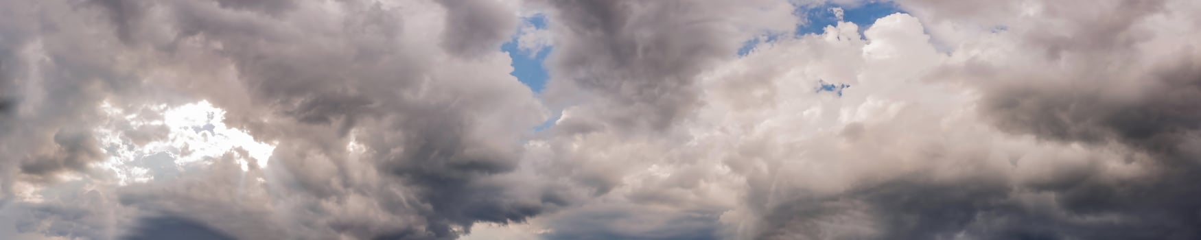 Dramatic panorama sky with storm cloud on a cloudy day. photo