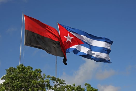 The flags of Cuba as well as of the 26th of July Movement in Havana, Cuba. photo