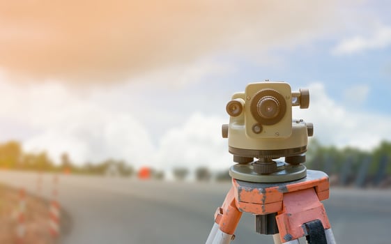 road construction site, theodolite instrument for road construction photo