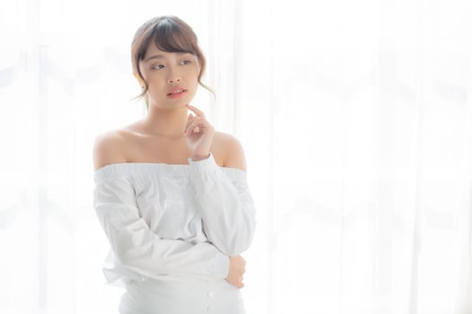 Beautiful portrait young asian woman makeup of cosmetic, asia girl smile and happy attractive, face beauty perfect with wellness skin care and healthcare, lifestyle wellbeing concept. photo