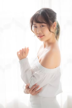 Beautiful portrait young asian woman makeup of cosmetic, asia girl smile and happy attractive, face beauty perfect with wellness skin care and healthcare, lifestyle wellbeing concept. photo