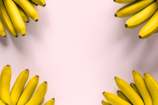 Banana fruit on pink background. photo