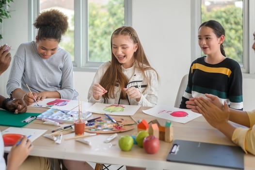 group of students studying and playing with teacher, education and learning concept. photo