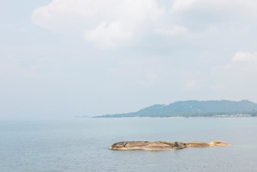 Sea landscape with rocks in the foreground and sky in the background. Therapeutic natural scenery gives a feeling of relaxation. At Koh Samui, Surat Thani Province, Thailand photo