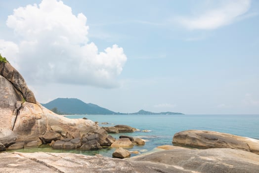 Sea landscape with rocks in the foreground and sky in the background. Therapeutic natural scenery gives a feeling of relaxation. At Koh Samui, Surat Thani Province, Thailand photo