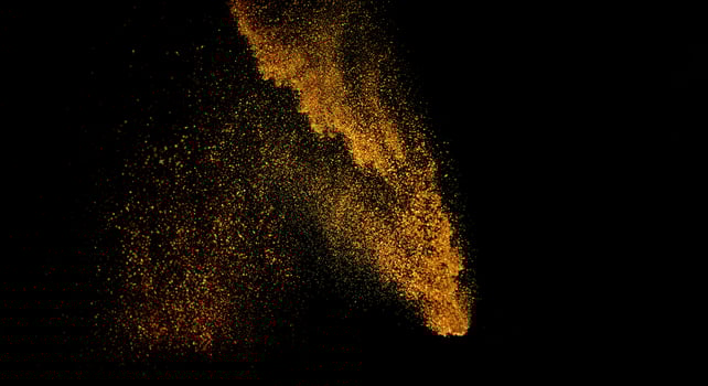 glitter vintage lights background. gold and black. de focused photo