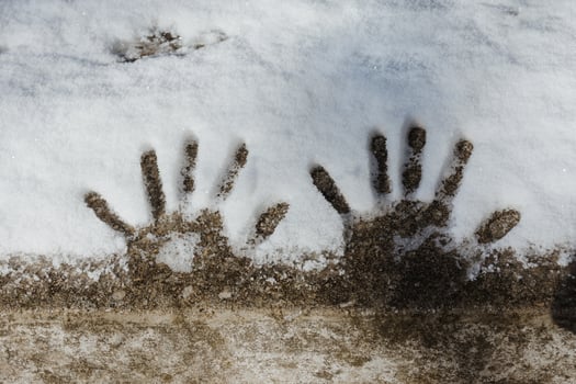 small handprints in the snow photo